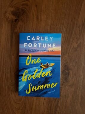 Carley Fortune "One Golden Summer" - Blue & Yellow Paperback Novel